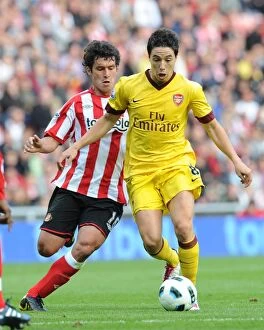Sunderland v Arsenal 2010-11 Collection: Samir Nasri (Arsenal) Cristian Riveros (Sunderland). Sunderland 1: 1 Arsenal