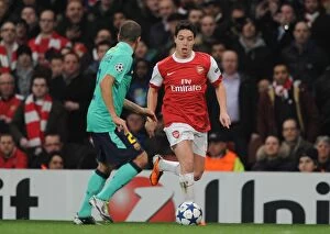 Arsenal v Barcelona 2010-11 Gallery: Samir Nasri (Arsenal) Daniel Alves (Barcelona). Arsenal 2: 1 Barcelona, UEFA Champions League