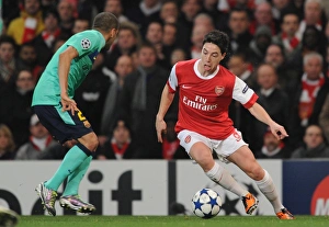 Arsenal v Barcelona 2010-11 Gallery: Samir Nasri (Arsenal) Daniel Alves (Barcelona). Arsenal 2: 1 Barcelona, UEFA Champions League