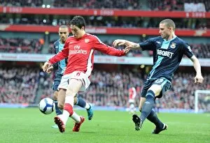 Arsenal v West Ham United 2009-10 Collection: Samir Nasri (Arsenal) Fabio Daprela (West Ham). Arsenal 2: 0 West Ham United