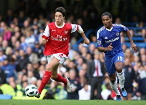 Chelsea v Arsenal 2010-11 Collection: Samir Nasri (Arsenal) Flourent Malouda (Chelsea). Chelsea 2: 0 Arsenal. Barclays Premier League
