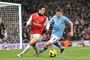 Images Dated 5th January 2011: Samir Nasri (Arsenal) James Milner (Man City). Arsenal 0: 0 Manchester City