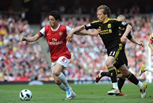 Arsenal v Liverpool 2010-2011 Collection: Samir Nasri (Arsenal) Lucas Leiva (Liverpool). Arsenal 1: 1 Liverpool. Barclays Premier League