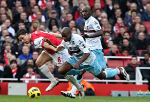 Arsenal V West Ham United 2010-11 Prints: Samir Nasri (Arsenal) Luis Boa Morte and Henrita Ilunga (West Ham). Arsenal 1