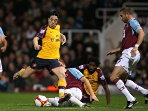 Images Dated 26th October 2008: Samir Nasri (Arsenal) Matthew Upson (West Ham)