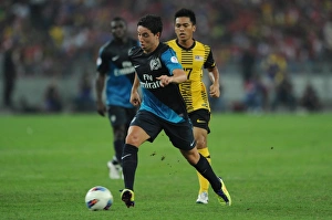 Samir Nasri (Arsenal) Mohd Zafuan (Mayaysia). Suajuna Hotel, Kuala Lumpur, Malaysia Samir Nasri (Arsenal) Mohd Zafuan (Mayaysia). Suajuna Hotel, Kuala Lumpur, Malaysia
