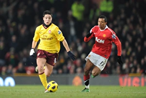 Images Dated 13th December 2010: Samir Nasri (Arsenal) Nani (Man United). Manchester United 1: 0 Arsenal