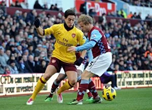 Aston Villa v Arsenal 2010-11 Gallery: Samir Nasri (Arsenal) nutmegs Barry Bannan (Villa). Aston Villa 2: 4 Arsenal