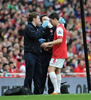 Images Dated 2nd April 2011: Samir Nasri (Arsenal) with physio Colin Lewin. Arsenal 0: 0 Blackburn Rovers