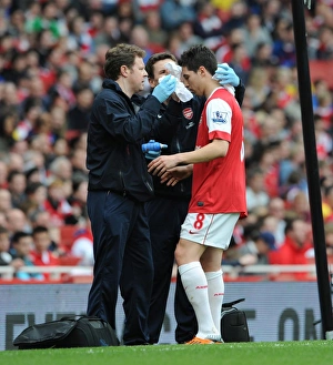 Arsenal v Blackburn Rovers 2010 - 2011 Collection: Samir Nasri (Arsenal) with physio Colin Lewin. Arsenal 0: 0 Blackburn Rovers