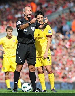 Images Dated 15th August 2010: Samir Nasri (Arsenal) and referee Martin Atkinson. Liverpool 1: 1 Arsenal