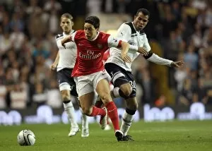 Tottenham Hotspur v Arsenal - Carling Cup 2010-11 Collection: Samir Nasri (Arsenal) Sandro (Tottenham). Tottenham Hotspur 1: 4 Arsenal (aet)