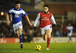 Images Dated 1st January 2011: Samir Nasri (Arsenal) Scott Dann (Birmingham). Birmingham City 0: 3 Arsenal