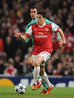 Arsenal v Barcelona 2010-11 Gallery: Samir Nasri (Arsenal) Sergio Busquets (Barcelona). Arsenal 2: 1 Barcelona
