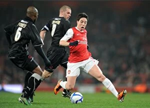 Arsenal v Leyton Orient FA Cup Replay 2010-11 Collection: Samir Nasri (Arsenal) Terrell Forbes and Stephen Dawson (Orient). Arsenal 5