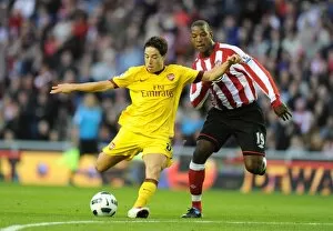 Sunderland v Arsenal 2010-11 Collection: Samir Nasri (Arsenal) Titus Bramble (Sunderland). Sunderland 1: 1 Arsenal