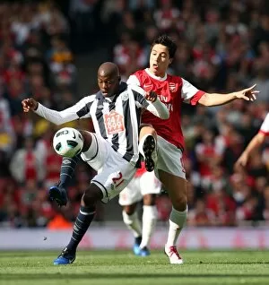 Images Dated 25th September 2010: Samir Nasri (Arsenal) Youssouf Mulumbu (WBA). Arsenal 2: 3 West Bromwich Albion