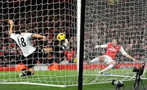 Samir Nasri beats Aaron Hughes (Fulham) on his way to scoring his and Arsenals 2nd goal