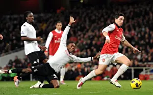 Arsenal V Fulham 2010-11 Prints: Samir Nasri beats Dickson Etuhu and John Pantsil (Fulham) on his way to scoring his