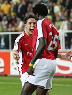Samir Nasri celebrates with Emmanuel Adebayor (Arsenal)