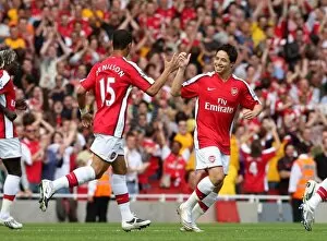 Samir Nasri celebrates scoring Arsenals goal with Denilson