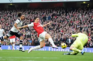 Arsenal V Tottenham Hotspur 2010-11 Prints: Samir Nasri knocks the ball past Heurelho Gomes (Tottenham) on his way to scoring Arsenals 1st goal