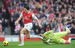 Arsenal V Tottenham Hotspur 2010-11 Prints: Samir Nasri rounds Heurelho Gomes (Tottenham) to the ball to score Arsenals 1st goal