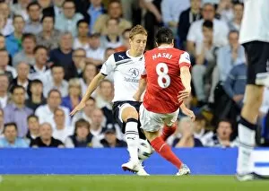 Samir Nasri scores Arsenals 2nd goal past Michael Dawson (Tottenham)