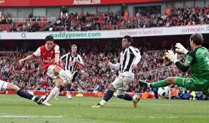 Arsenal v West Bromwich Albion 2010-11 Gallery: Samir Nasri scores his and Arsenals 2nd goal past Scott carsona and Gonzalo Jara