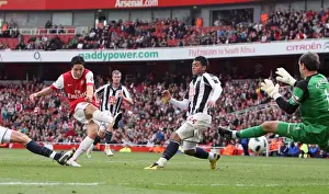 Samir Nasri scores his and Arsenals 2nd goal past Scott carsona and Gonzalo Jara
