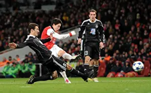 Arsenal V Partizan Belgrade 2010-11 Prints: Samir Nasri scores Arsenals 3rd goal under pressure from Vojislav Stankovic