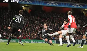 Arsenal V Partizan Belgrade 2010-11 Prints: Samir Nasri shoots past Partizan goalkeeper Vladimir Stojkovic to score the 3rd Arsenal goal