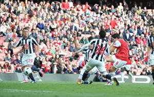 Samir Nasri shoots past WBA goalkeeper Scott Carson to score the 2nd Arsenal goal