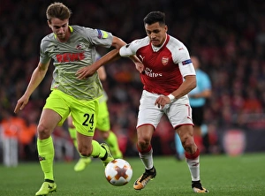 Arsenal V FC Köln 2017-18 Prints: Sanchez vs. Klunter: A Star-Studded Europa League Showdown at Arsenal's Emirates Stadium (Arsenal v FC Köln)