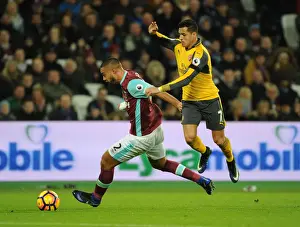 West Ham United V Arsenal 2016-17 Prints: Sanchez vs. Reid: A Premier League Battle at London Stadium - Arsenal vs