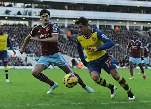 West Ham United V Arsenal 2014-15 Prints: Sanchez vs. Tomkins: A Premier League Battle at Boleyn Ground