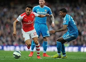 Arsenal v Sunderland 2014-15 Collection: Sanchez vs Van Aanholt: A Premier League Battle at Emirates Stadium (2014-15)