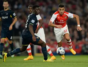 Arsenal V Southampton, League Cup 2014/15 Prints: Sanchez vs. Wanyama: A Footballing Showdown at the Emirates - Arsenal vs