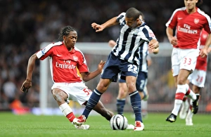Images Dated 22nd September 2009: Sanchez Watt (Arsenal) Gianni Zuiverloon (WBA)