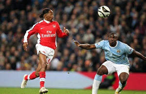 Manchester City v Arsenal - Carling Cup 2009-10 Collection: Sanchez Watt (Arsenal) Micah Richards (Man City). Manchester City 3: 0 Arsenal