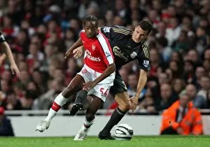 Arsenal v Liverpool - Carling Cup 2009-10 Collection: Sanchez Watt (Arsenal) Philipp Degen (Liverpool)