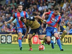 Images Dated 16th August 2015: Sanchez's Battle at the Palace: Arsenal Star Clashes with Crystal Palace Defenders