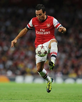 Arsenal V Fenerbahce 2013-14 Prints: Santi Cazorla in Action: Arsenal vs. Fenerbahce UEFA Champions League Play-offs (2013)