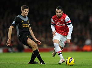 Images Dated 30th January 2013: Santi Cazorla (Arsenal) Steven Gerrard (Liverpool). Arsenal 2: 2 Liverpool. Barclays Premier League