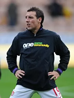 Santi Cazorla (Arsenal) warms up in his Kick it Out T Shirt. Norwich City 1: 0 Arsenal