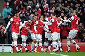 Santi Cazorla celebrates scoring Arsenals 1st goal with his team mates. Arsenal 2: 1 Aston Villa