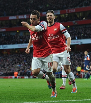 Santi Cazorla celebrates scoring his and Arsenals 1st goal with Olivier Giroud. Arsenal 2:0 Fulham Santi Cazorla celebrates scoring his and Arsenals 1st goal with Olivier Giroud. Arsenal 2:0 Fulham