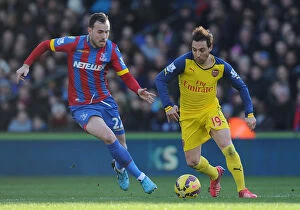 Images Dated 21st February 2015: Santi Cazorla Dashes Past Crystal Palace: Arsenal vs Crystal Palace, Premier League 2014-15
