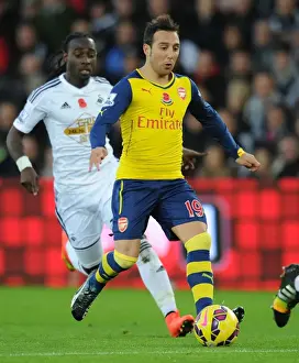 Swansea V Arsenal 2014-15 Prints: Santi Cazorla Dashes Past Marvin Emnes: Swansea vs. Arsenal, Premier League 2014-15