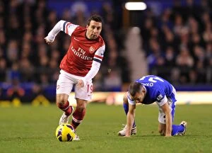 Images Dated 28th November 2012: Santi Cazorla Outmaneuvers Bryan Oviedo: Everton vs Arsenal, Premier League 2012-13
